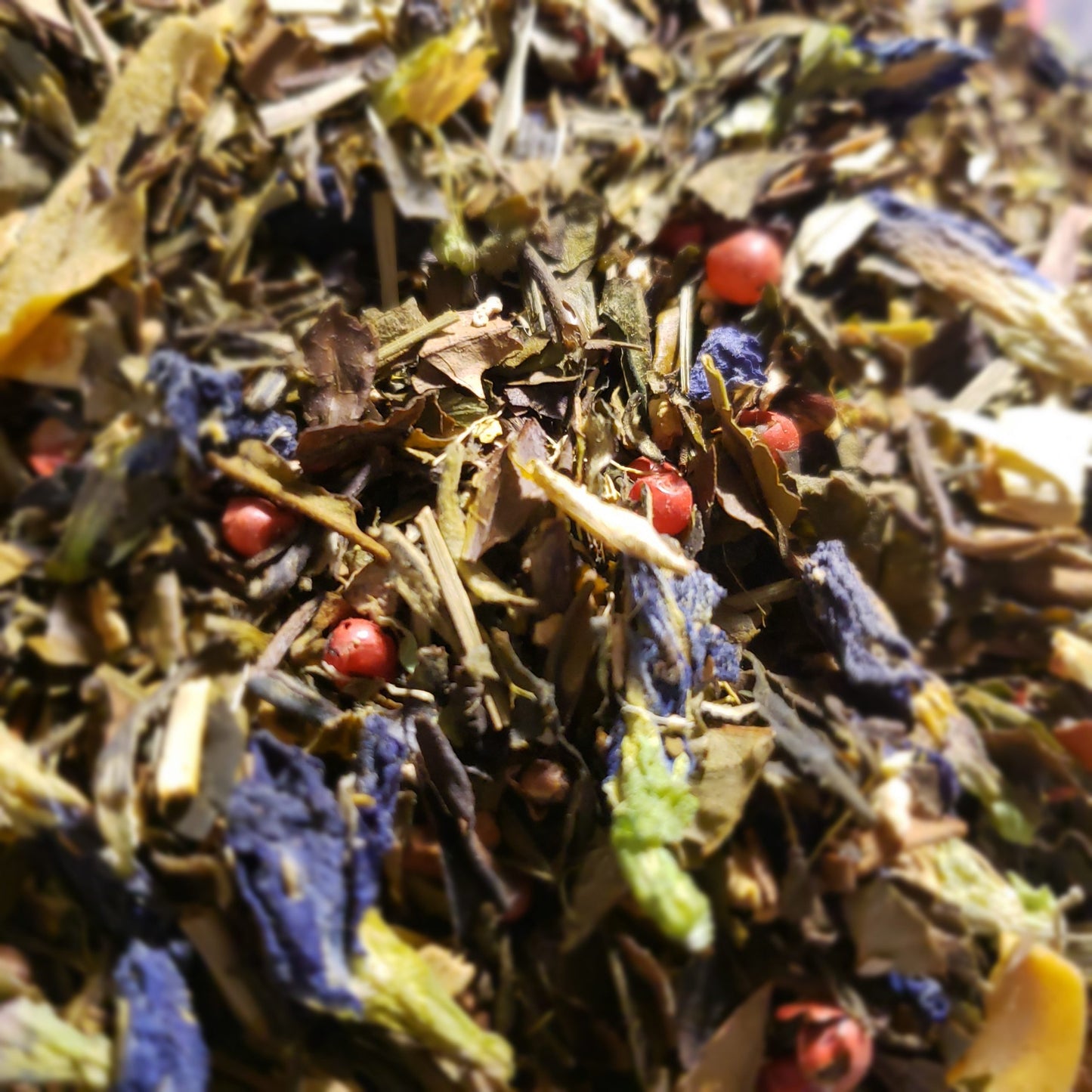 Close up image of tea leaves, herbs and spices include in Elevated tea blend